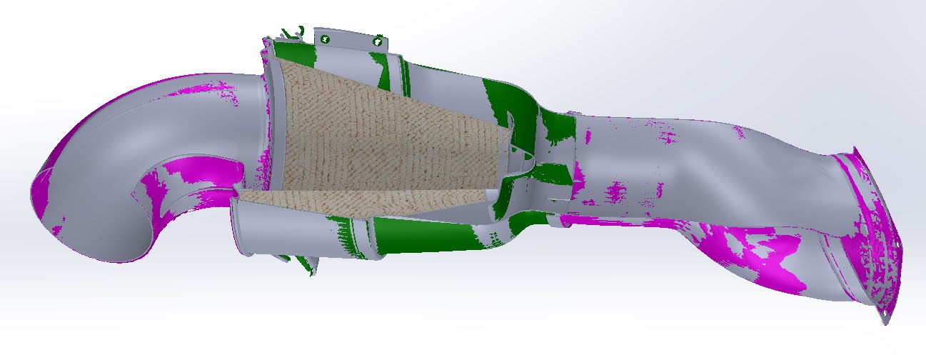 Cutaway of the Corvette intake showing the 3D scan tracking the CAD through internal passages