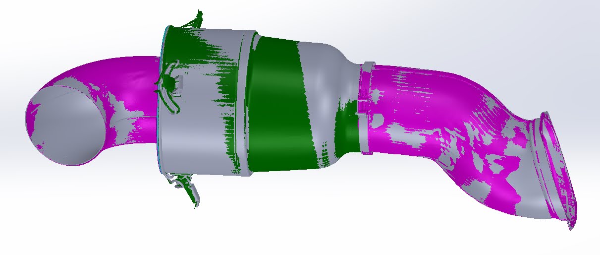 3D scan of a Corvette air intake overlaid in purple and green on the CAD model
