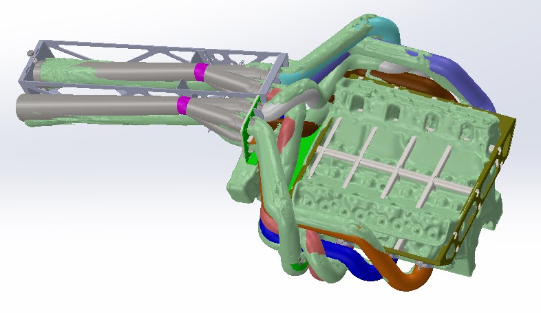 CAD model of equal-length headers overlaid on a 3D scan of the chassis