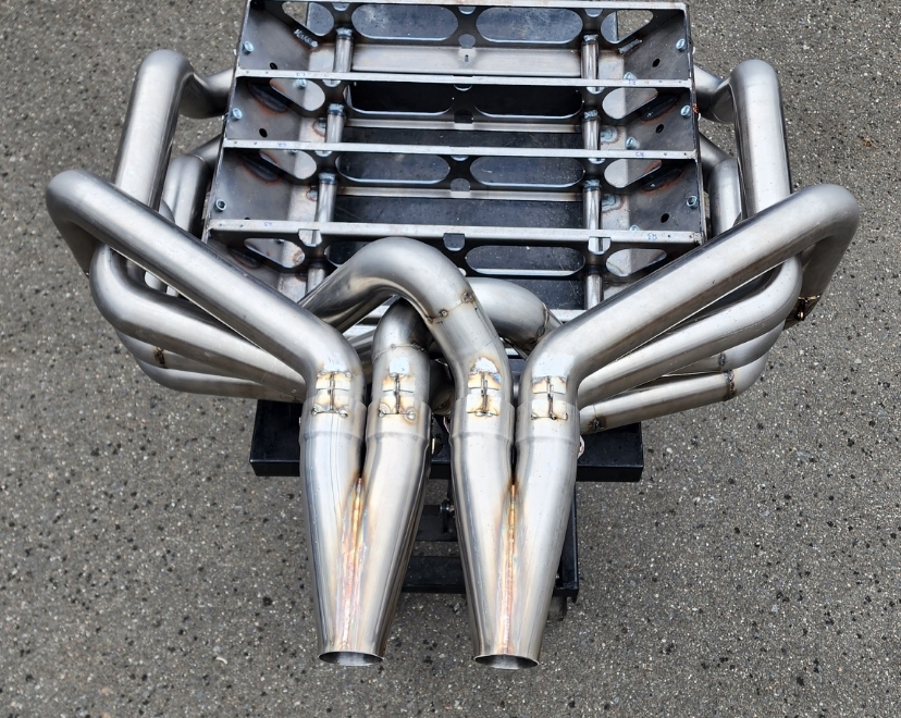 Header tubes tacked together while held in the printed fixture