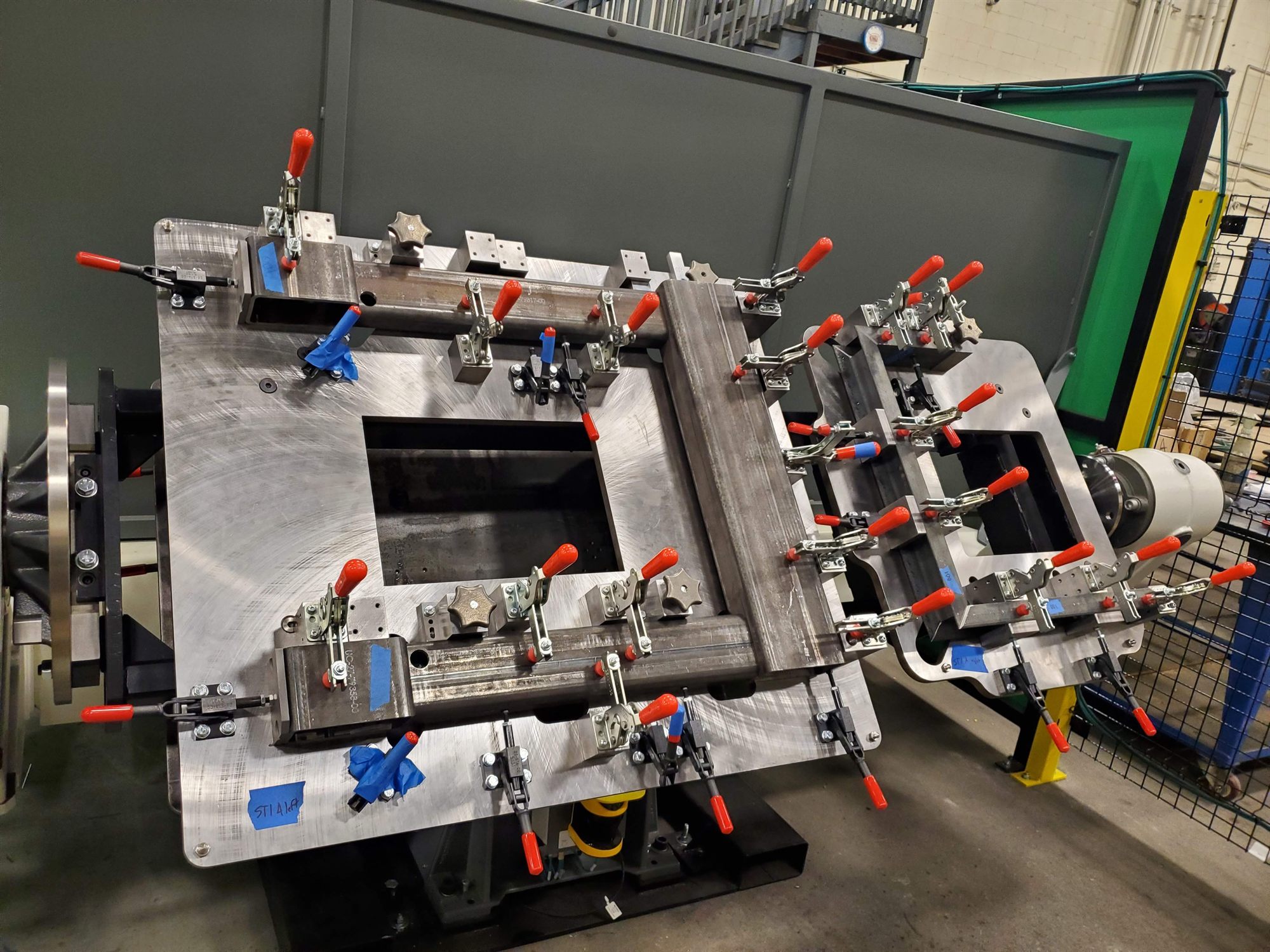 Weld fixture holding parts to fifteen thousandths of an inch